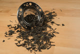 shan valley first flush green tea and strainer